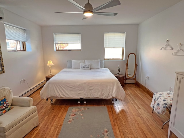 30 Water St, Ellsworth, ME 04605 - bedroom featuring multiple windows, baseboard heating, and ceiling fan