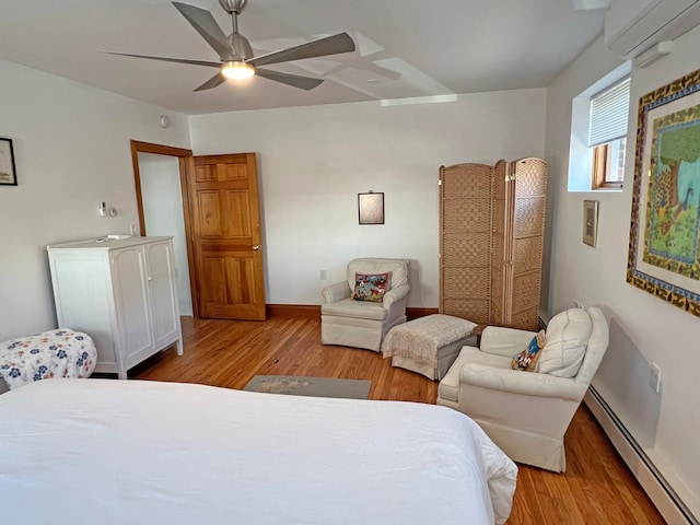 30 Water St, Ellsworth, ME 04605 - bedroom featuring baseboard heating, a wall mounted air conditioner, light wood-type flooring, and ceiling fan
