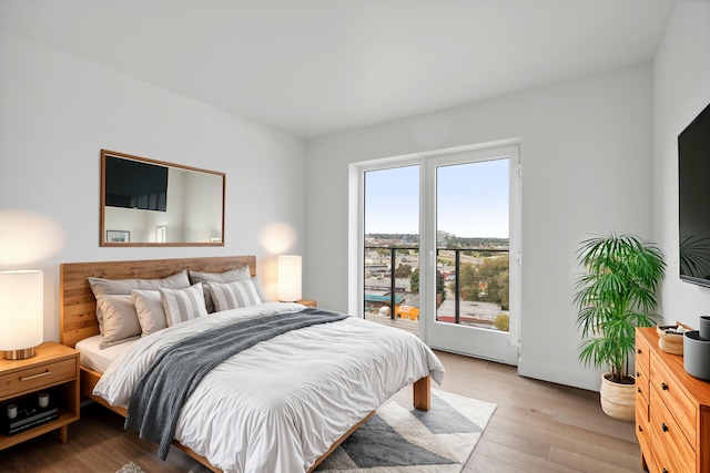 bedroom with light wood-type flooring