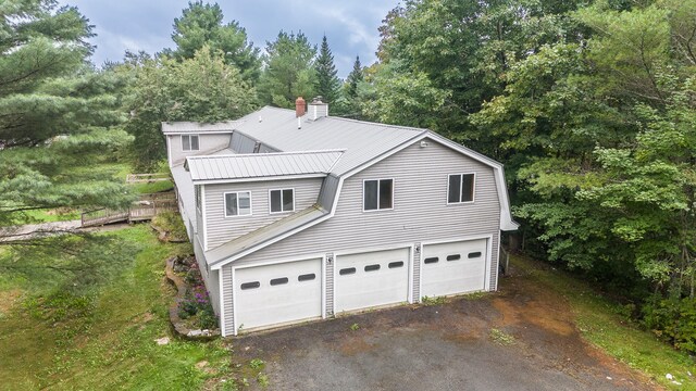 exterior space featuring a garage