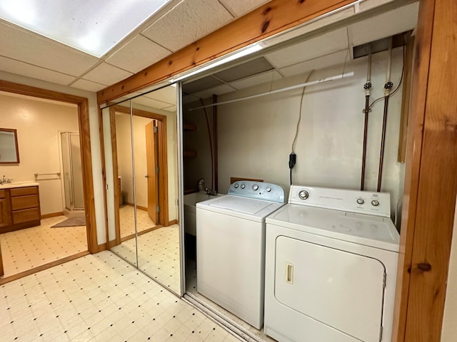 laundry room with separate washer and dryer