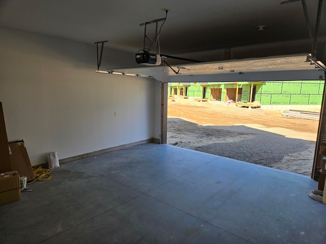 garage featuring a garage door opener