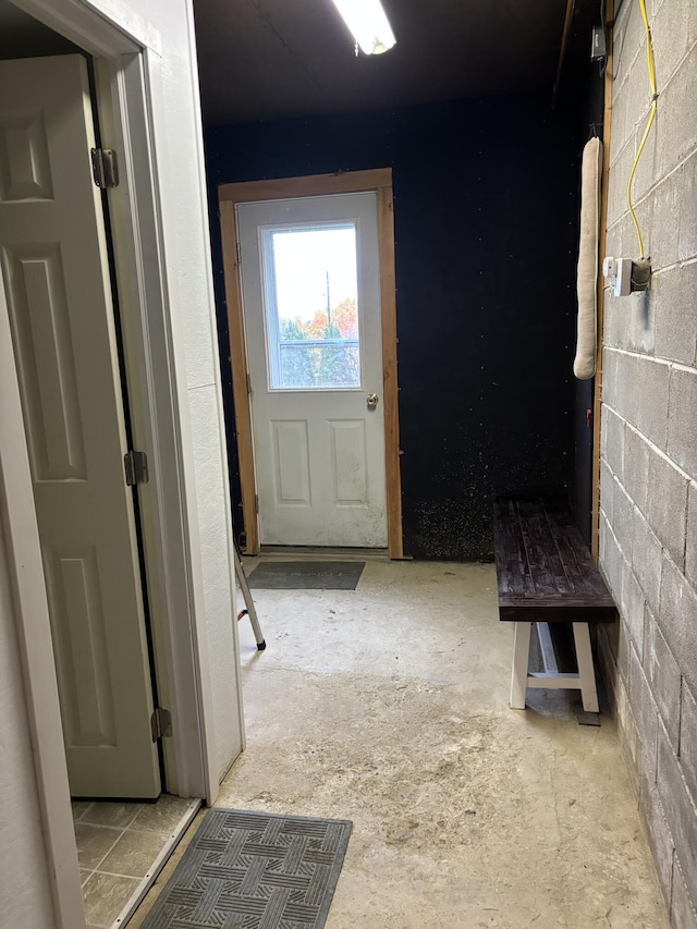 entryway with concrete floors