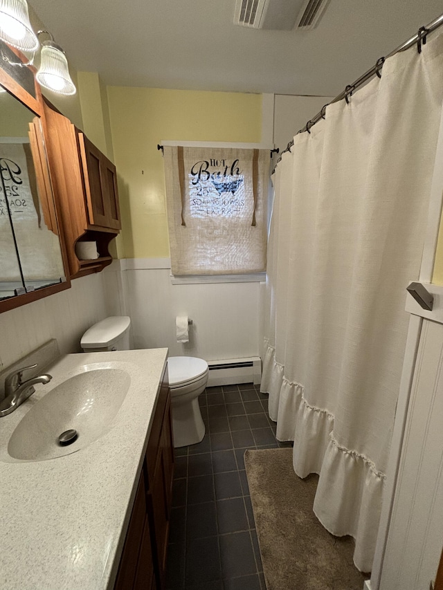 bathroom featuring a baseboard radiator, a shower with shower curtain, tile patterned floors, vanity, and toilet