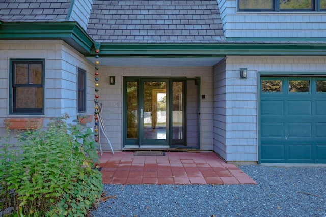 property entrance with a garage