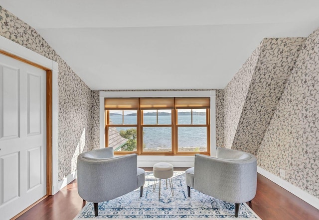 65 Grange Hall Rd, Sullivan, ME 04664 - home office featuring vaulted ceiling, a water view, wood finished floors, wallpapered walls, and baseboards