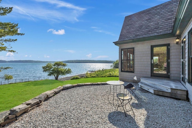 65 Grange Hall Rd, Sullivan, ME 04664 - view of patio with a water view