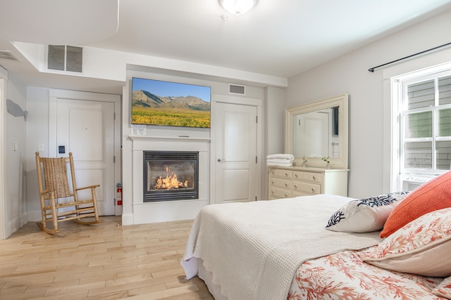 bedroom featuring light wood-type flooring