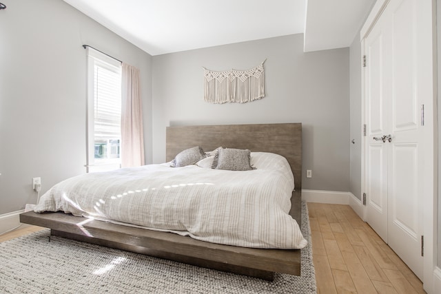 bedroom featuring hardwood / wood-style floors