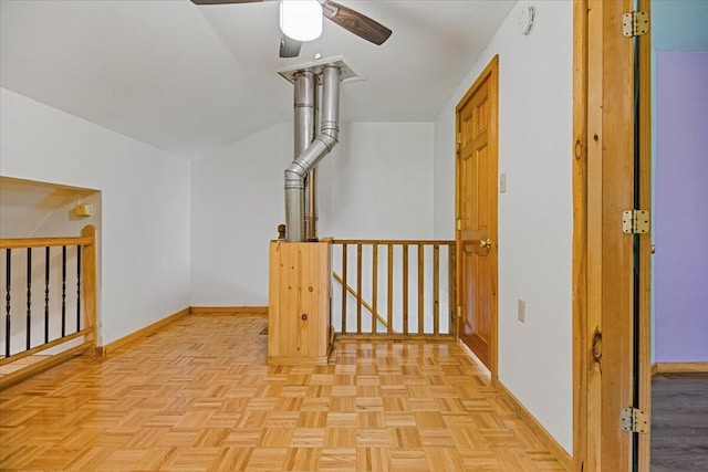 bonus room featuring ceiling fan and light parquet flooring