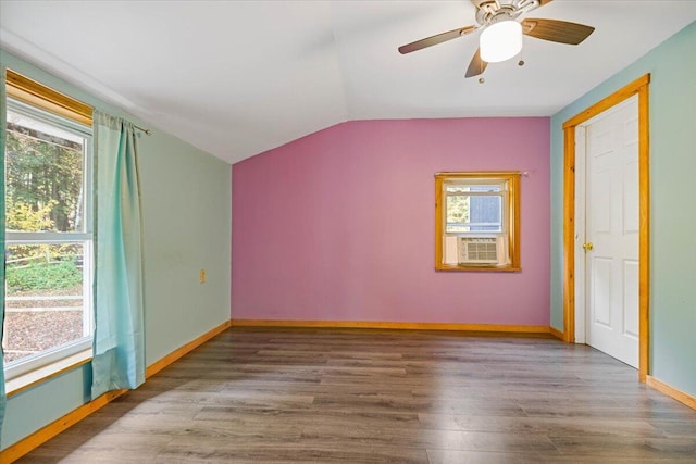 unfurnished bedroom with wood-type flooring, vaulted ceiling, and ceiling fan