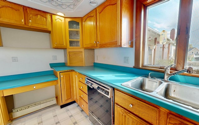 kitchen with sink, black dishwasher, and a baseboard heating unit