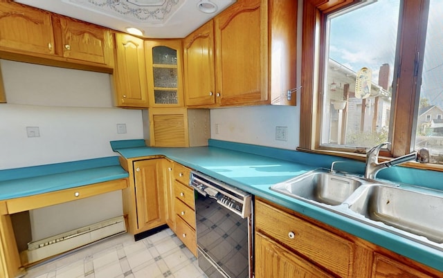 kitchen with glass insert cabinets, black dishwasher, brown cabinetry, light floors, and a sink