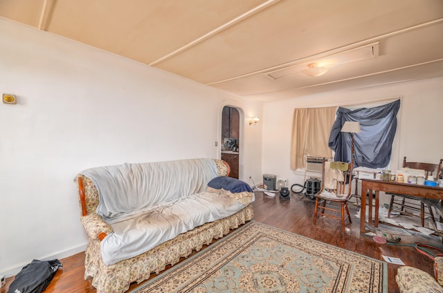 living room with dark hardwood / wood-style flooring