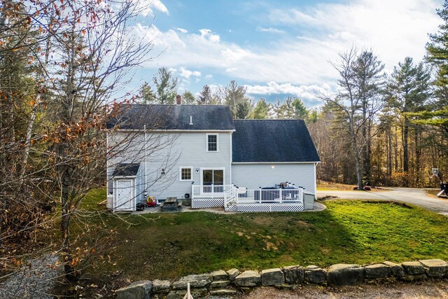 49 Balsam Dr, Waldoboro, ME 04572 - rear view of house featuring a yard and a deck