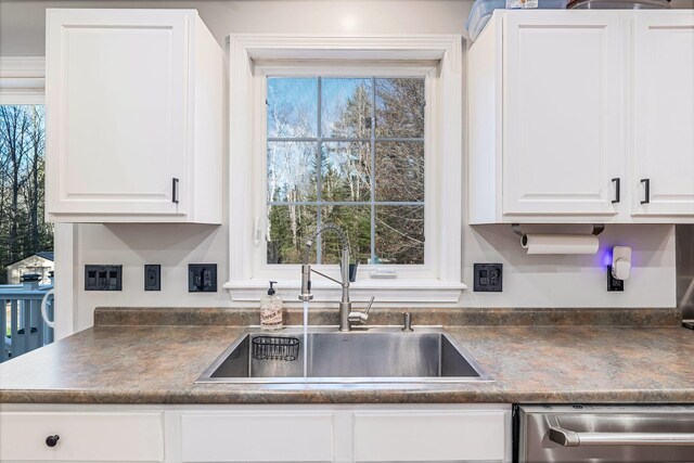 49 Balsam Dr, Waldoboro, ME 04572 - kitchen featuring white cabinetry, sink, and a wealth of natural light