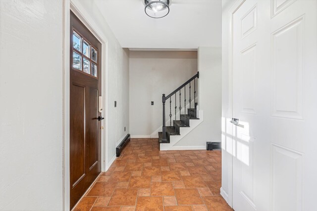 49 Balsam Dr, Waldoboro, ME 04572 - foyer entrance with a baseboard heating unit
