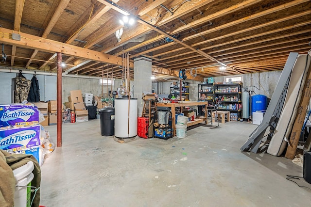 49 Balsam Dr, Waldoboro, ME 04572 - basement featuring a workshop area and water heater