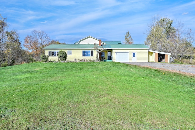 ranch-style home with a garage and a front lawn