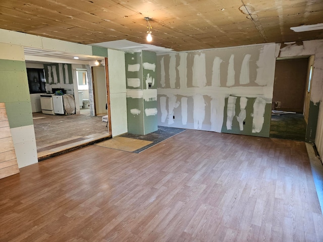 spare room with hardwood / wood-style floors