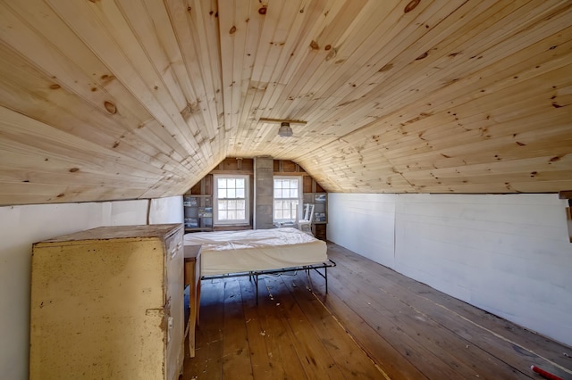 bonus room featuring dark hardwood / wood-style floors, wooden ceiling, and lofted ceiling