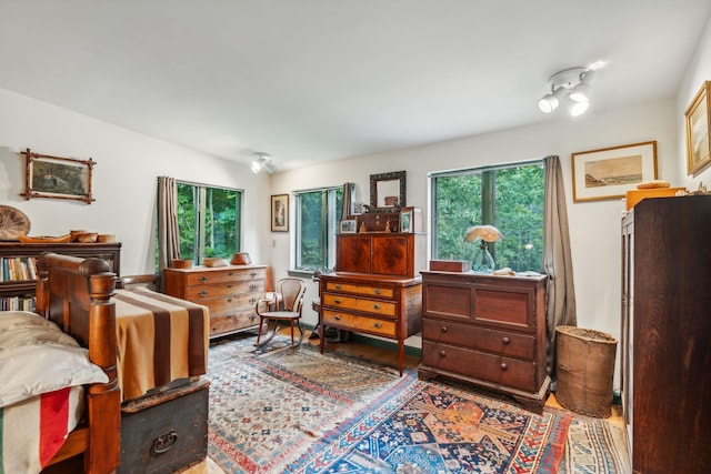 bedroom with wood finished floors
