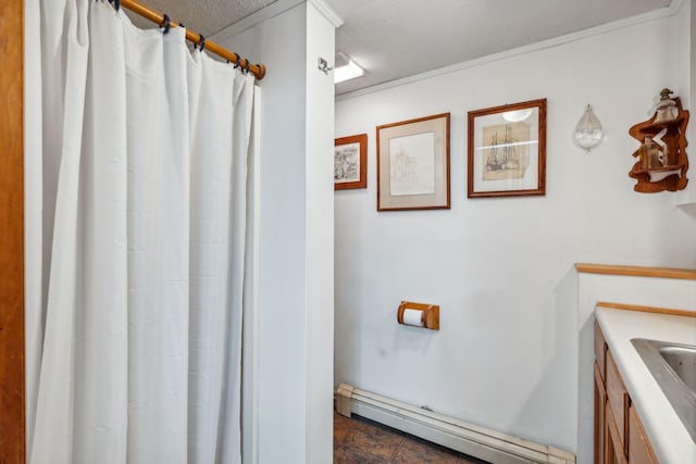 full bathroom with a baseboard radiator, curtained shower, and vanity