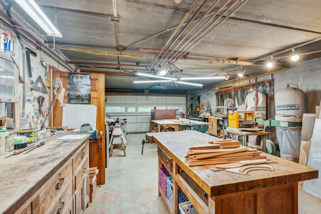 interior space with a garage and a workshop area
