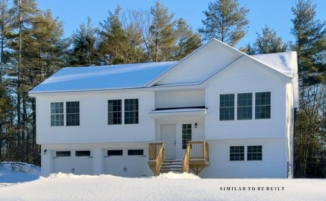 raised ranch featuring a garage