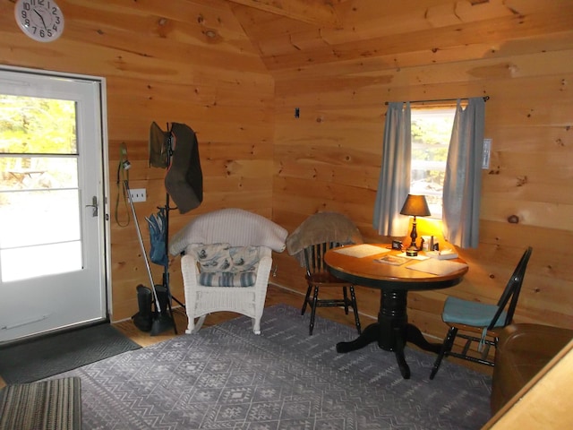 living area with wooden walls