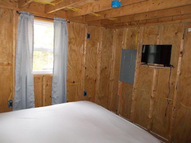 unfurnished bedroom featuring electric panel