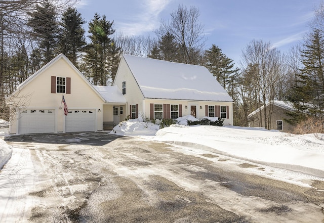 view of front of property with driveway and a garage