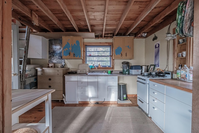 kitchen with light hardwood / wood-style floors, white range with gas stovetop, wood ceiling, sink, and white cabinetry