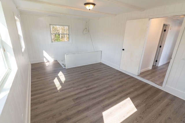 954 Mason Bay Rd, Jonesport, ME 04649 - empty room with wood finished floors and beam ceiling