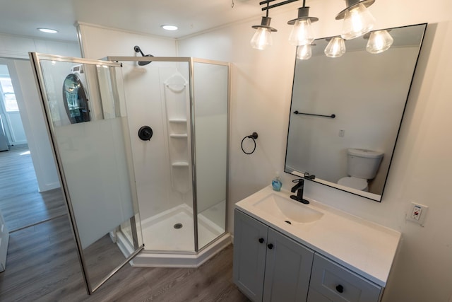 954 Mason Bay Rd, Jonesport, ME 04649 - full bathroom with wood finished floors, a stall shower, and vanity