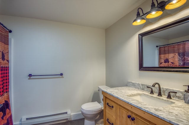 bathroom featuring toilet, vanity, hardwood / wood-style floors, and a baseboard heating unit