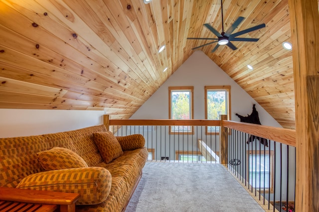 living area featuring carpet flooring, vaulted ceiling, and wooden ceiling