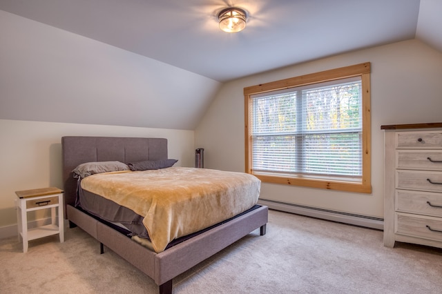 carpeted bedroom featuring lofted ceiling and baseboard heating