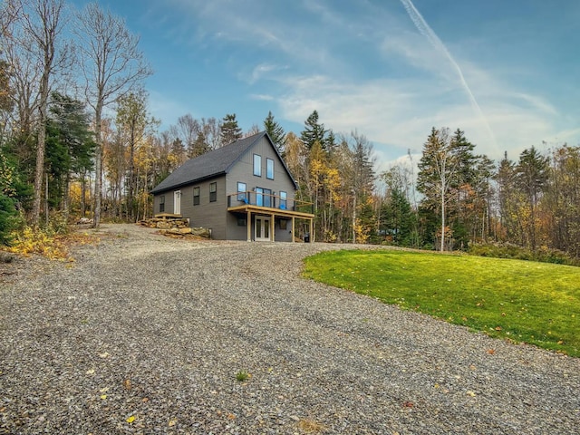 view of home's exterior featuring a yard