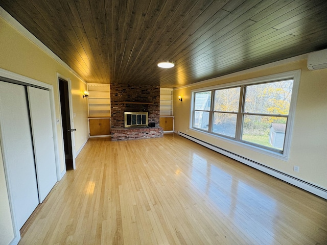 376 Fort Fairfield Rd, Caribou, ME 04736 - unfurnished living room featuring wood ceiling, a baseboard heating unit, light wood-style floors, a wall mounted AC, and a fireplace