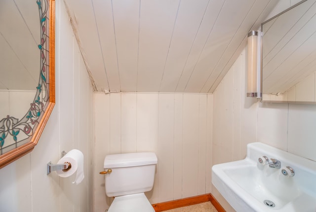 26 Charland St, Winslow, ME 04901 - bathroom with a sink, toilet, and a decorative wall