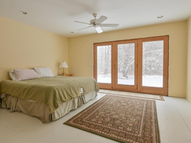 bedroom with ceiling fan and access to exterior