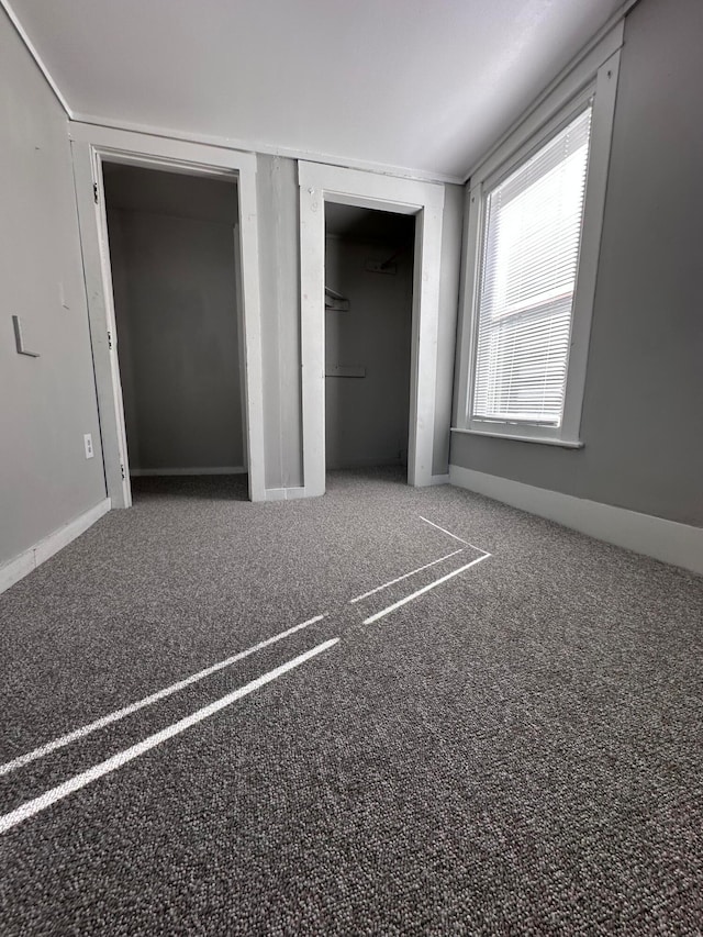 unfurnished bedroom with carpet