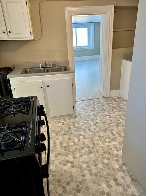 laundry area featuring sink