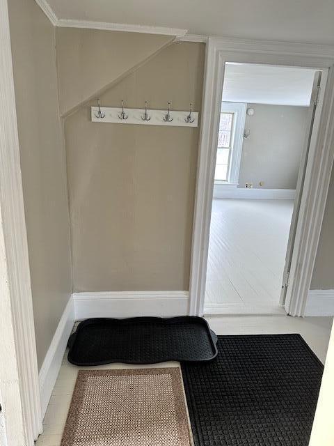 mudroom with ornamental molding