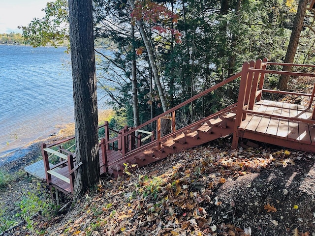 exterior space with a water view