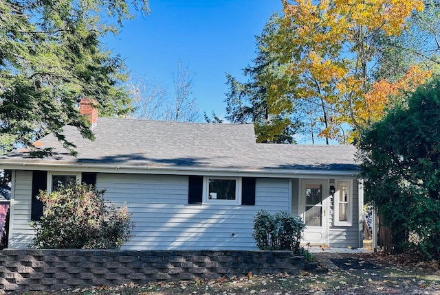 ranch-style house with a chimney