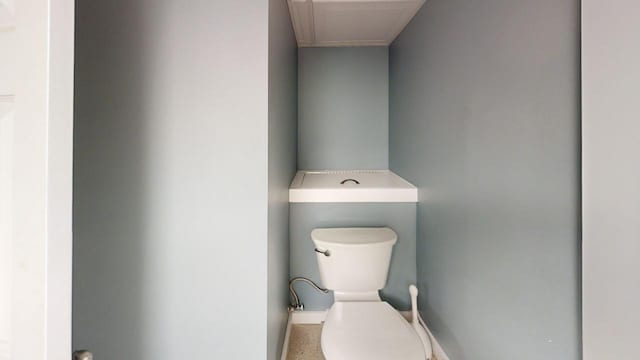 bathroom featuring toilet