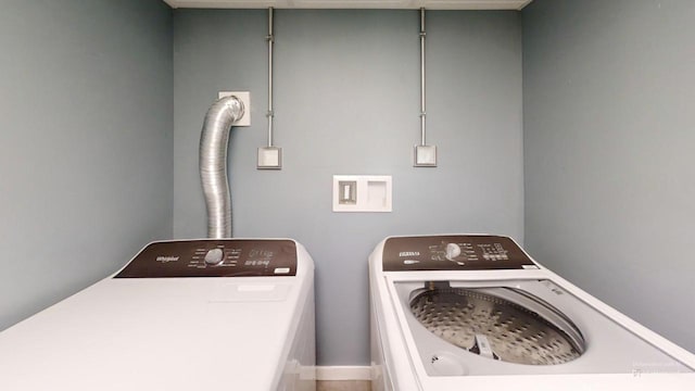 laundry area with washer and clothes dryer