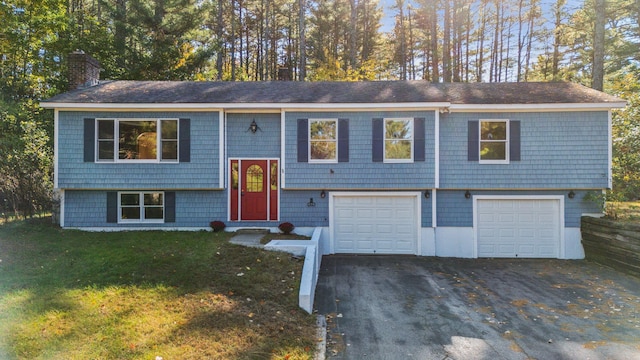 split foyer home featuring a garage